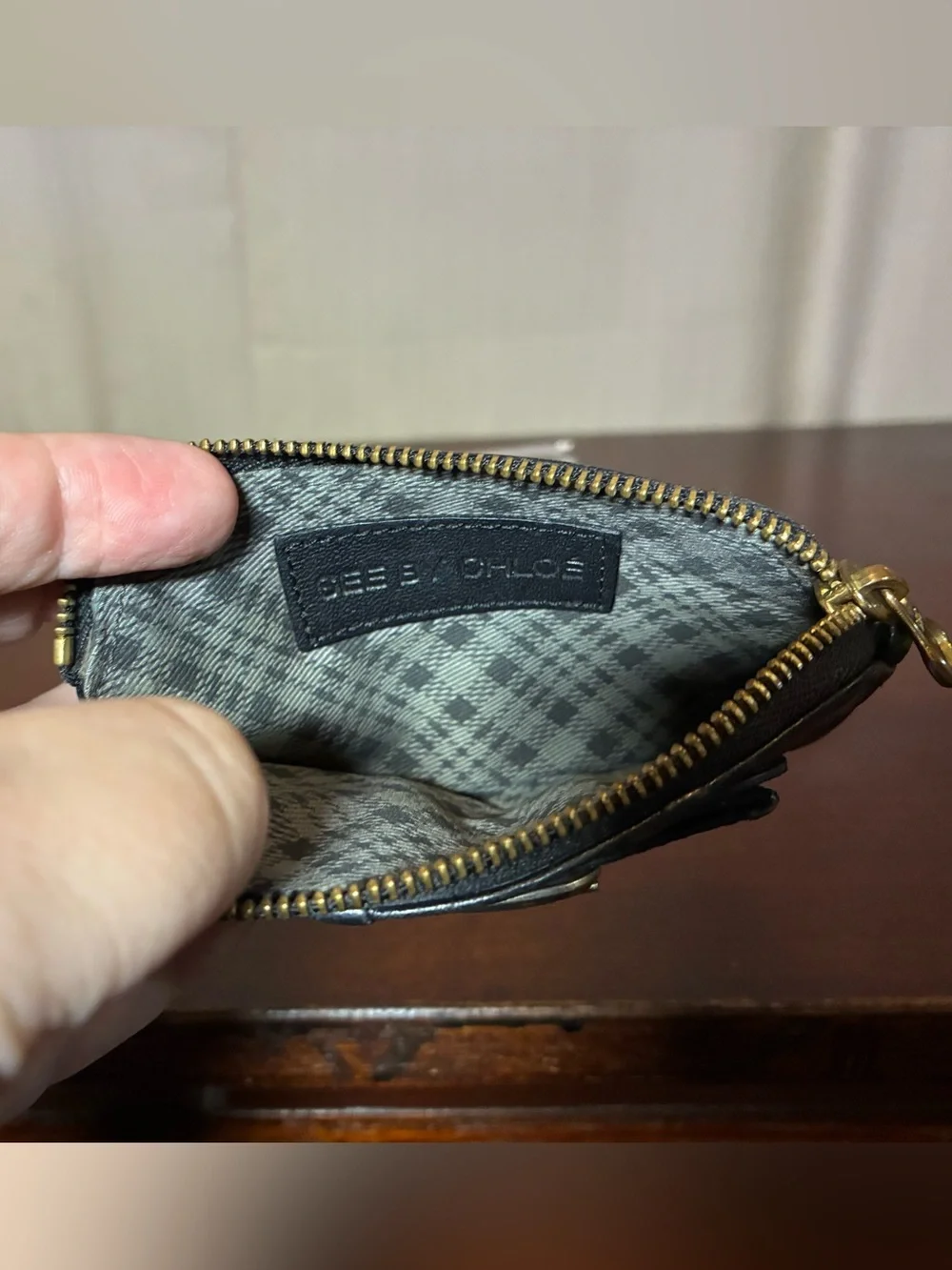 See By Chloe Black Leather Bow Wristlet Pouch with Gold Accent